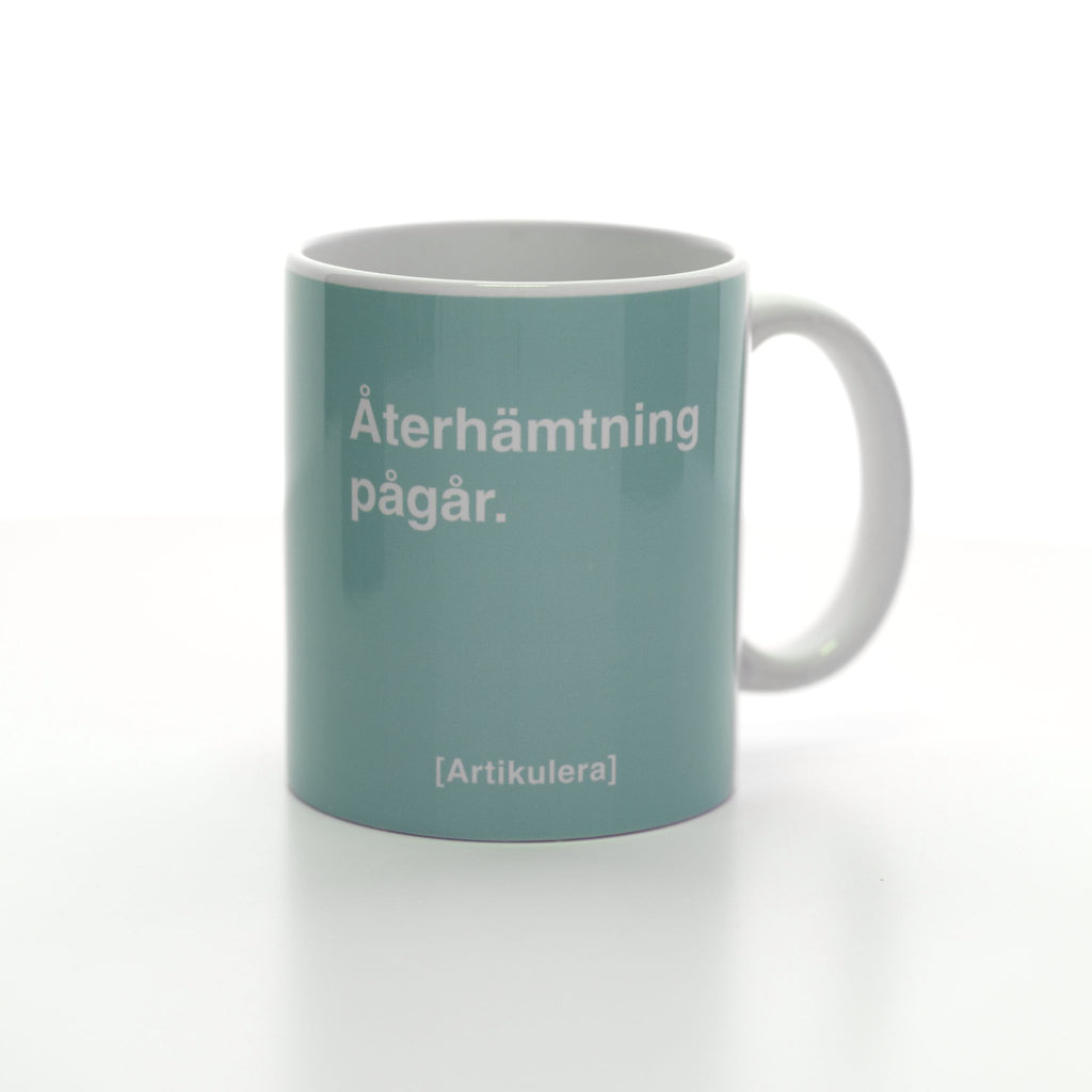 Artikulera-mugg — ”Återhämtning pågår.”