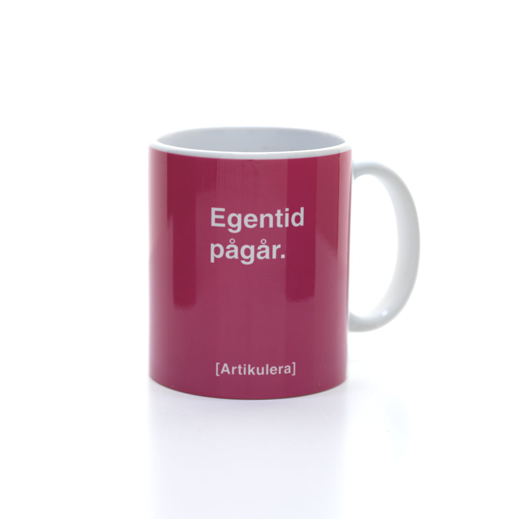 Artikulera-mugg — ”Egentid pågår.”