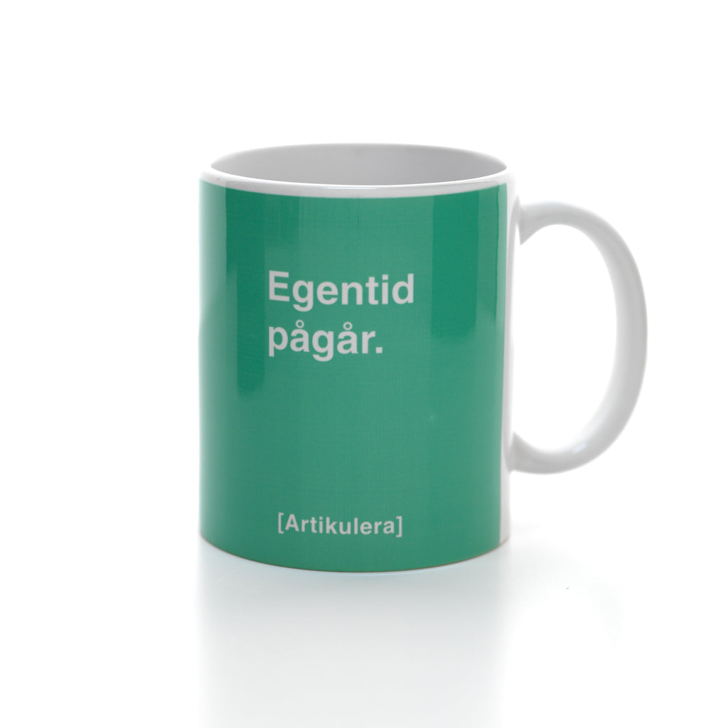 Artikulera-mugg — ”Egentid pågår.”