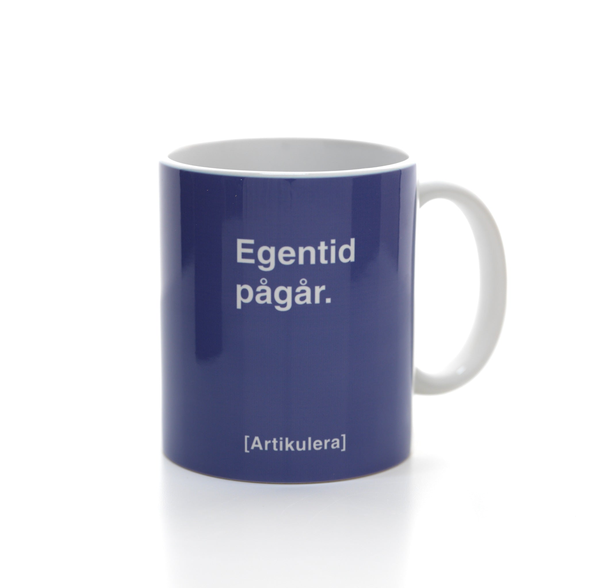 Artikulera-mugg — ”Egentid pågår.”