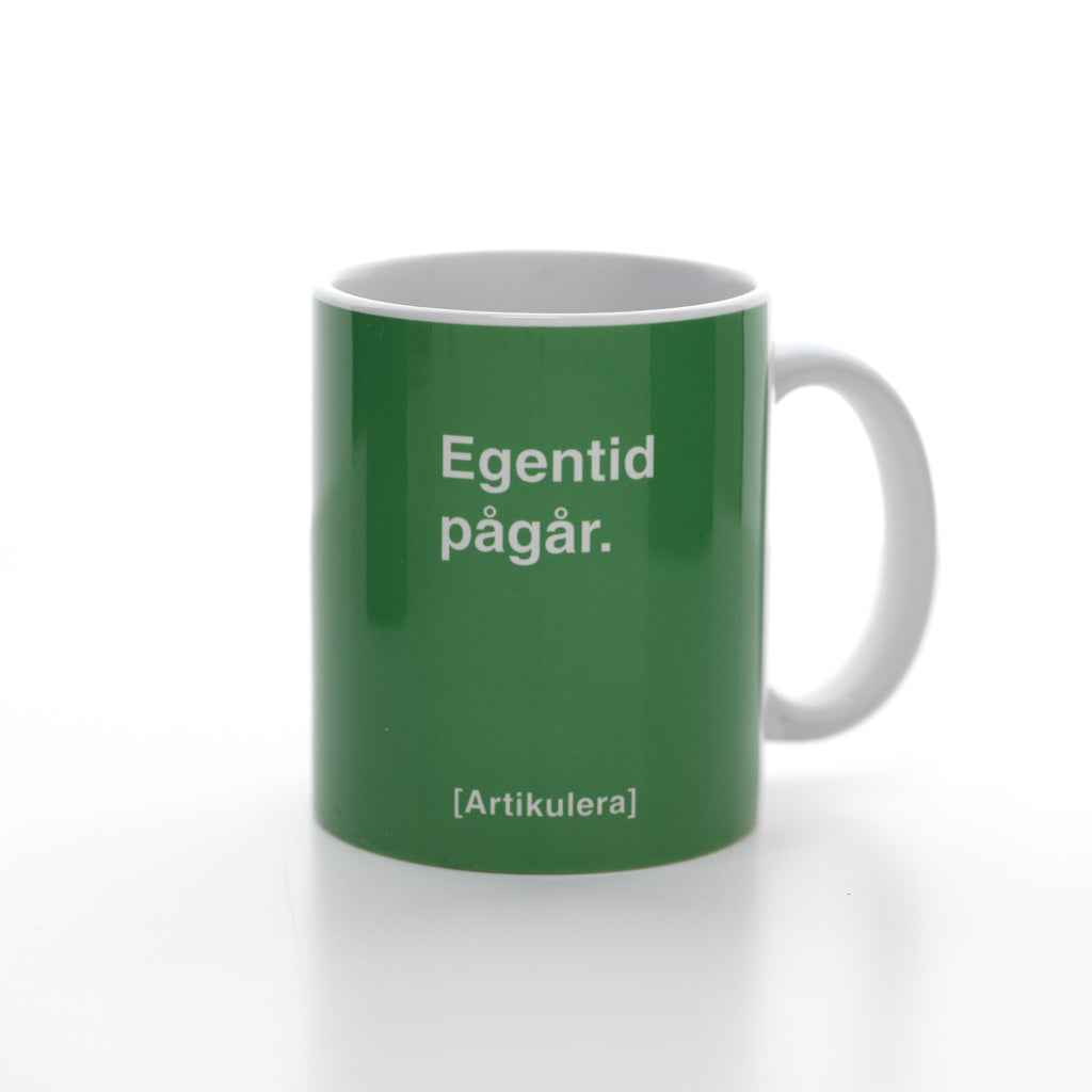 Artikulera-mugg — ”Egentid pågår.”