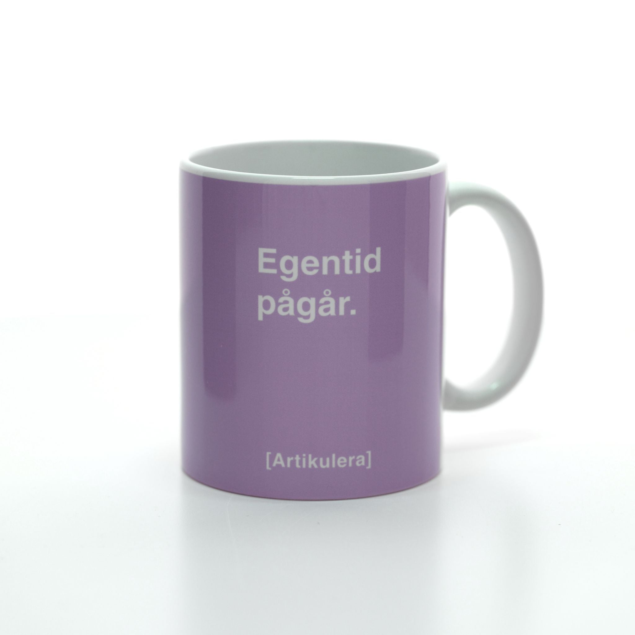 Artikulera-mugg — ”Egentid pågår.”