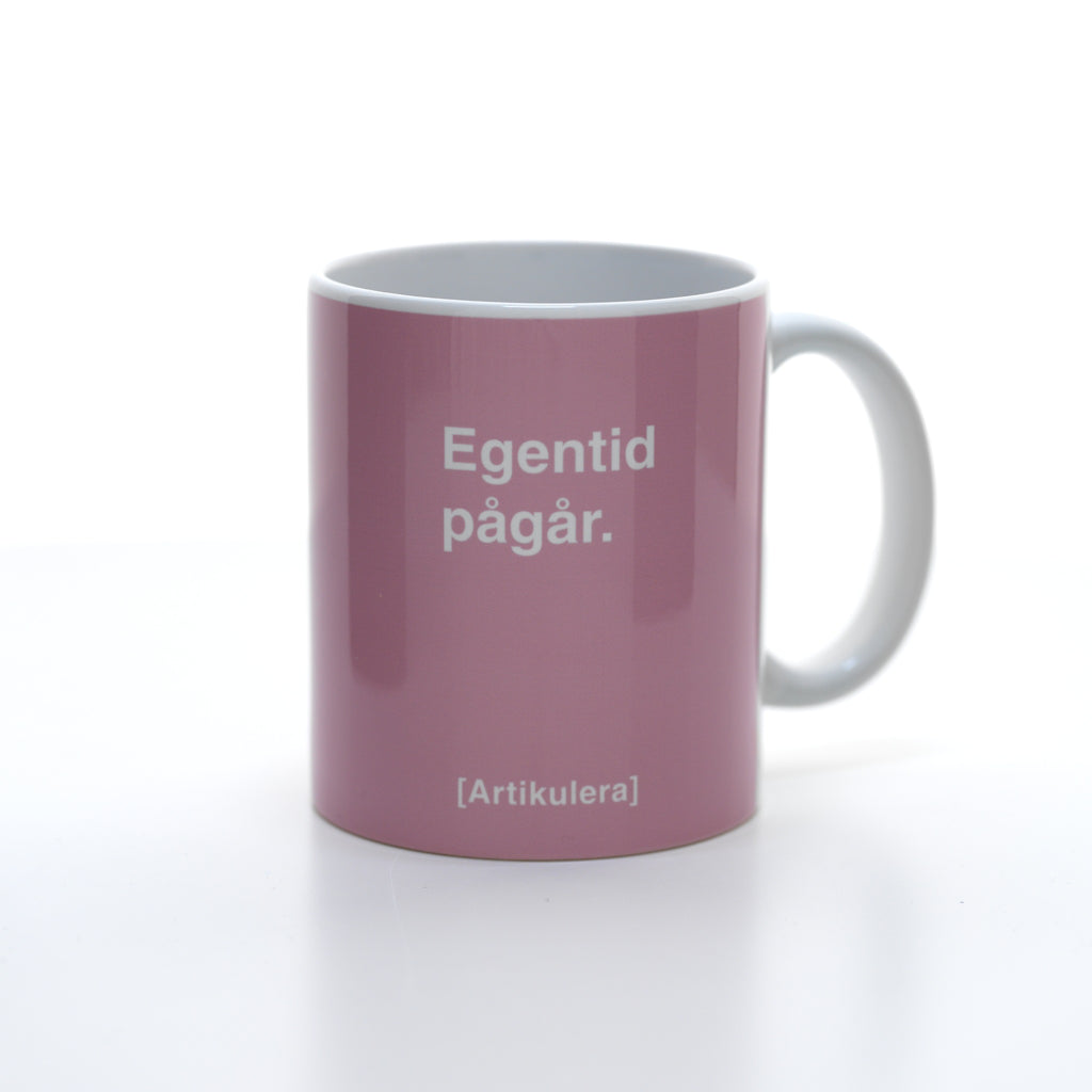 Artikulera-mugg — ”Egentid pågår.”