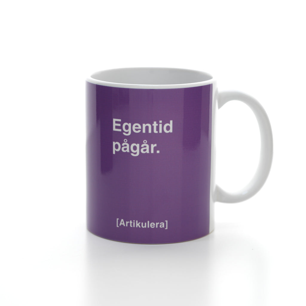 Artikulera-mugg — ”Egentid pågår.”