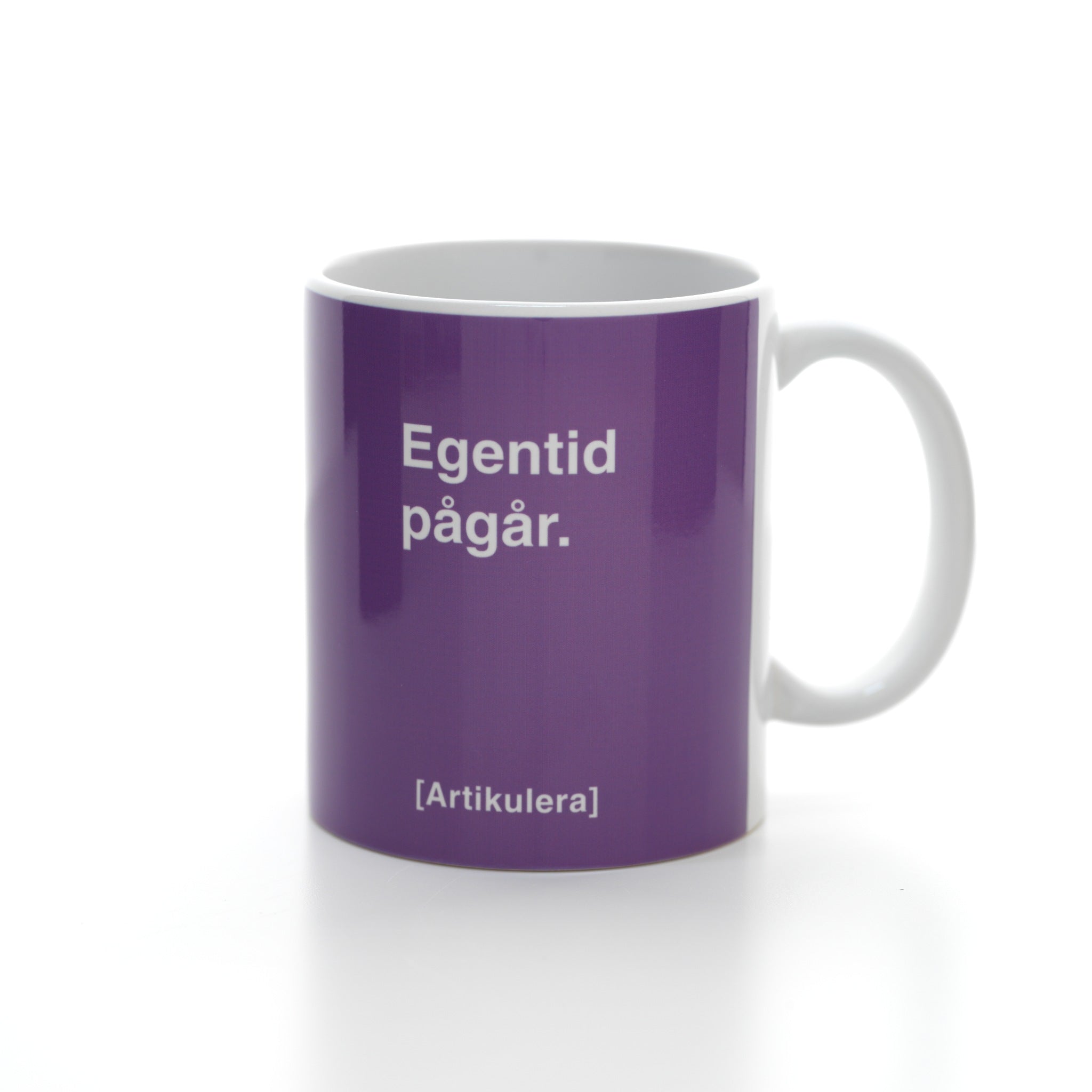 Artikulera-mugg — ”Egentid pågår.”