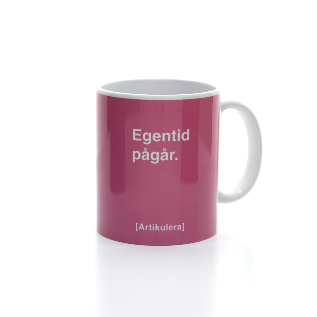 Artikulera-mugg — ”Egentid pågår.”