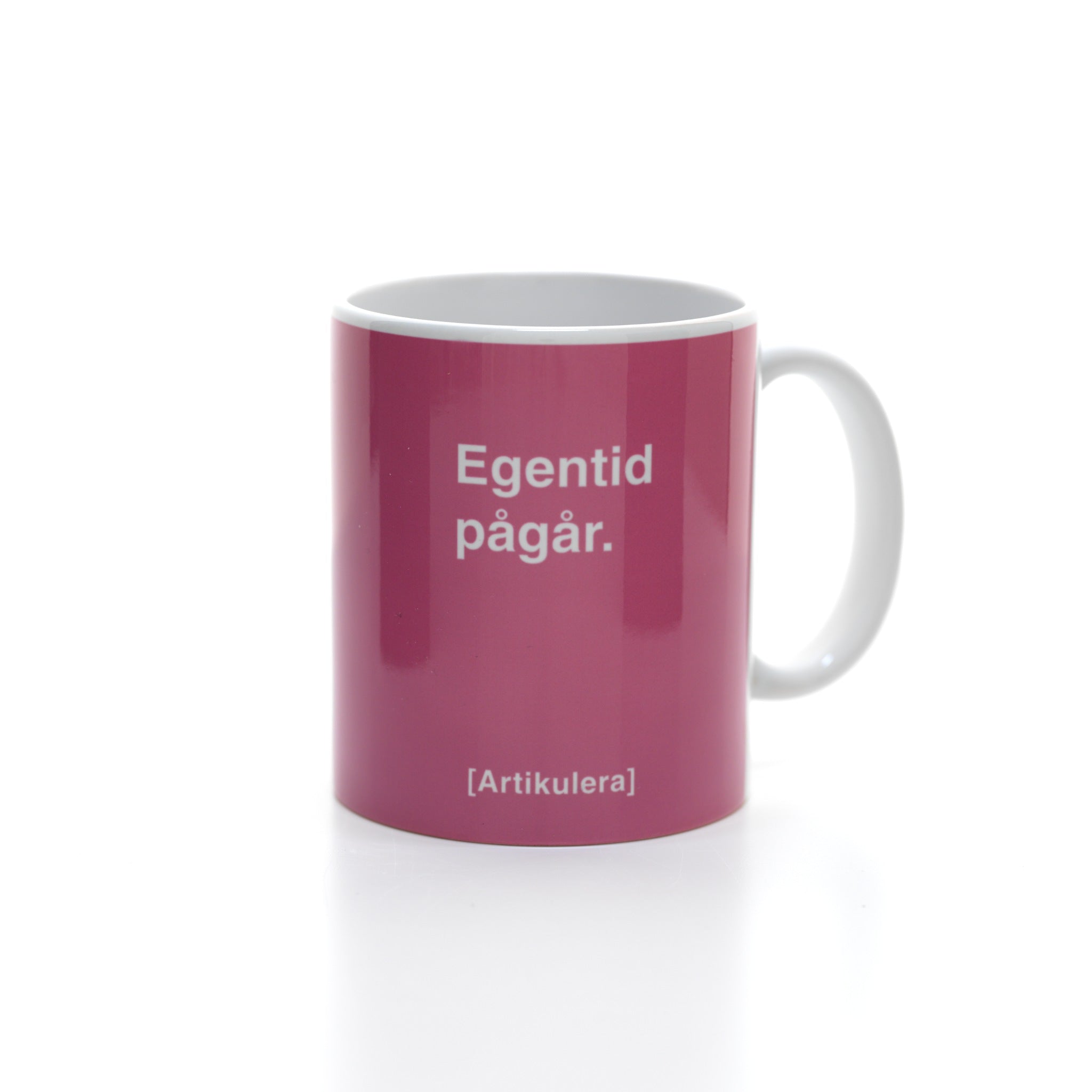 Artikulera-mugg — ”Egentid pågår.”