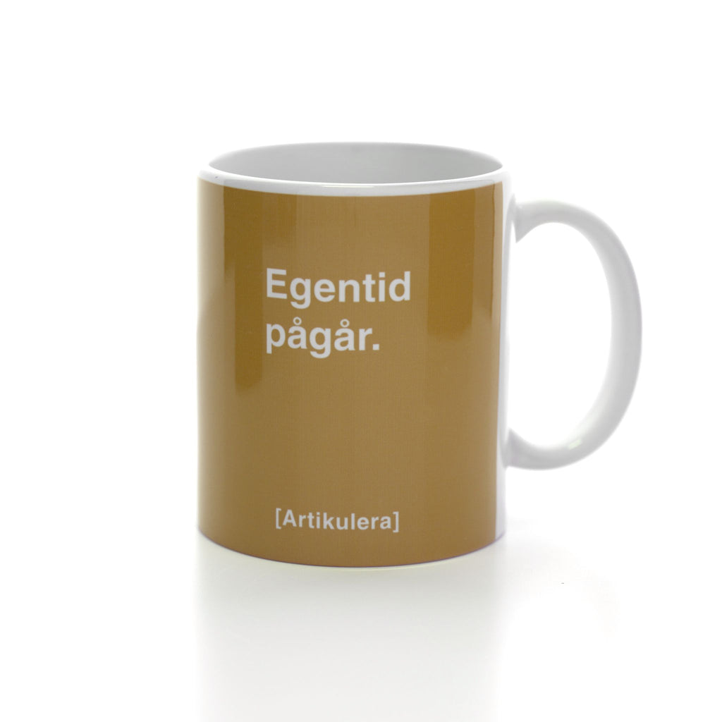 Artikulera-mugg — ”Egentid pågår.”