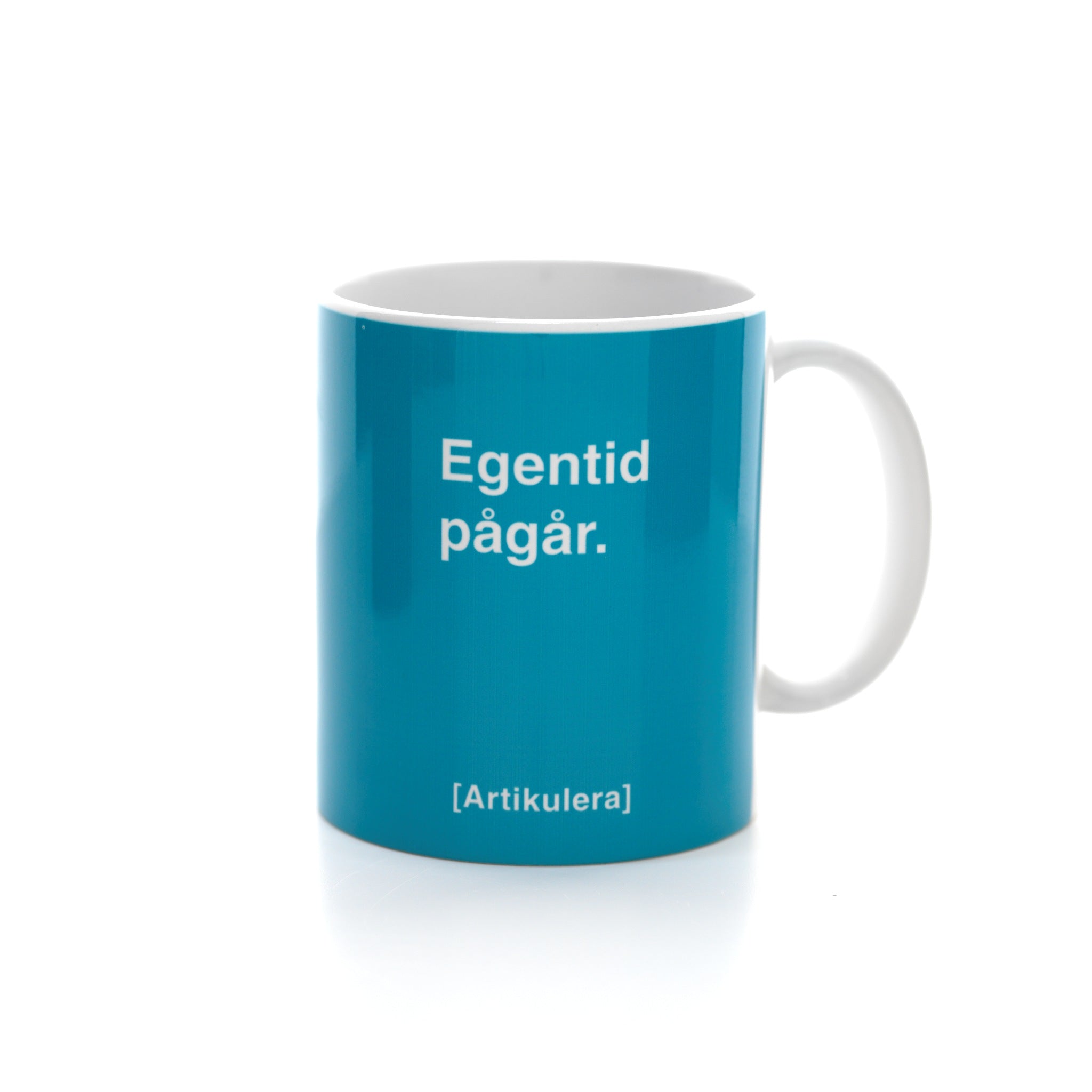Artikulera-mugg — ”Egentid pågår.”