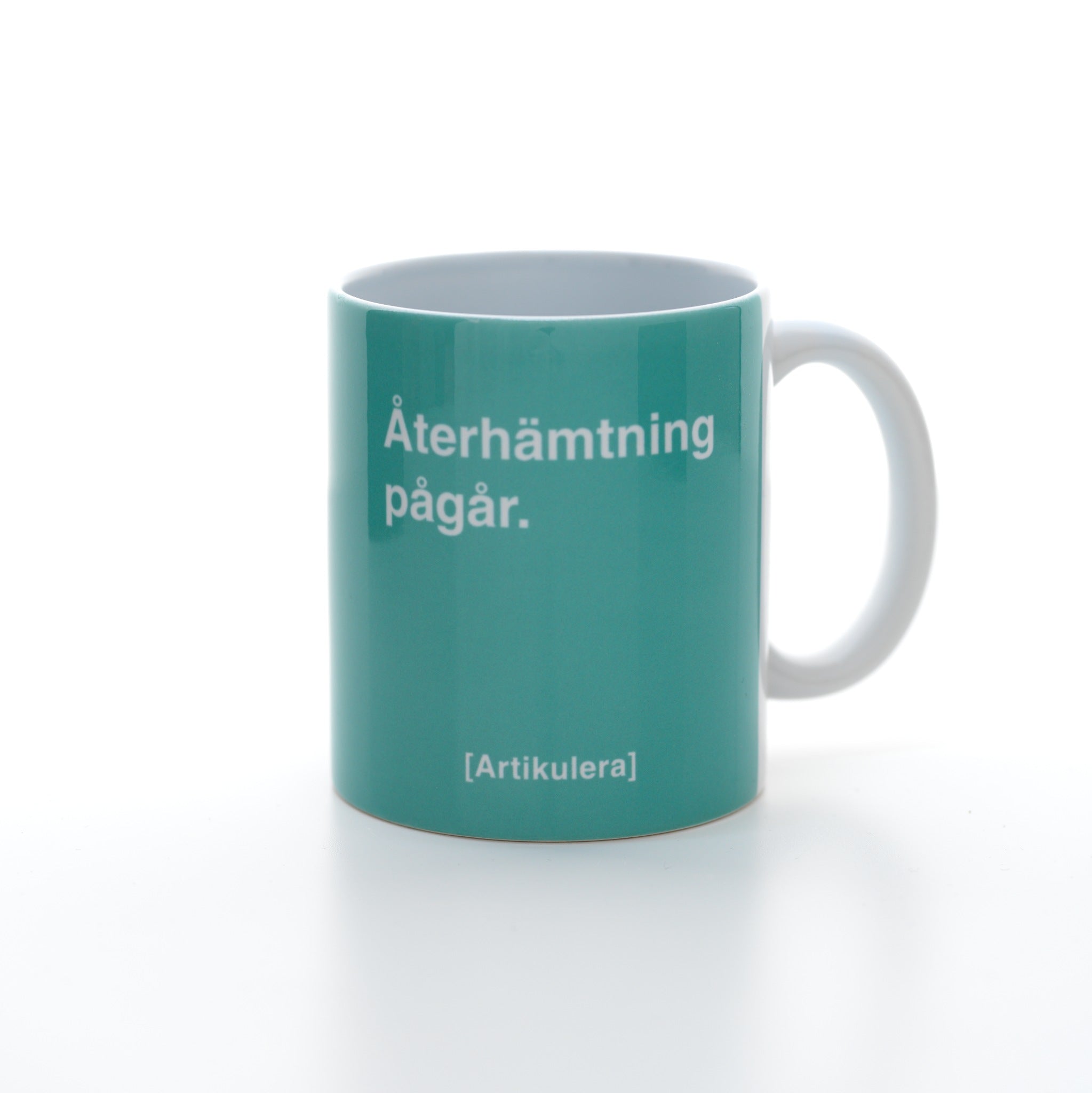 Artikulera-mugg — ”Återhämtning pågår.”
