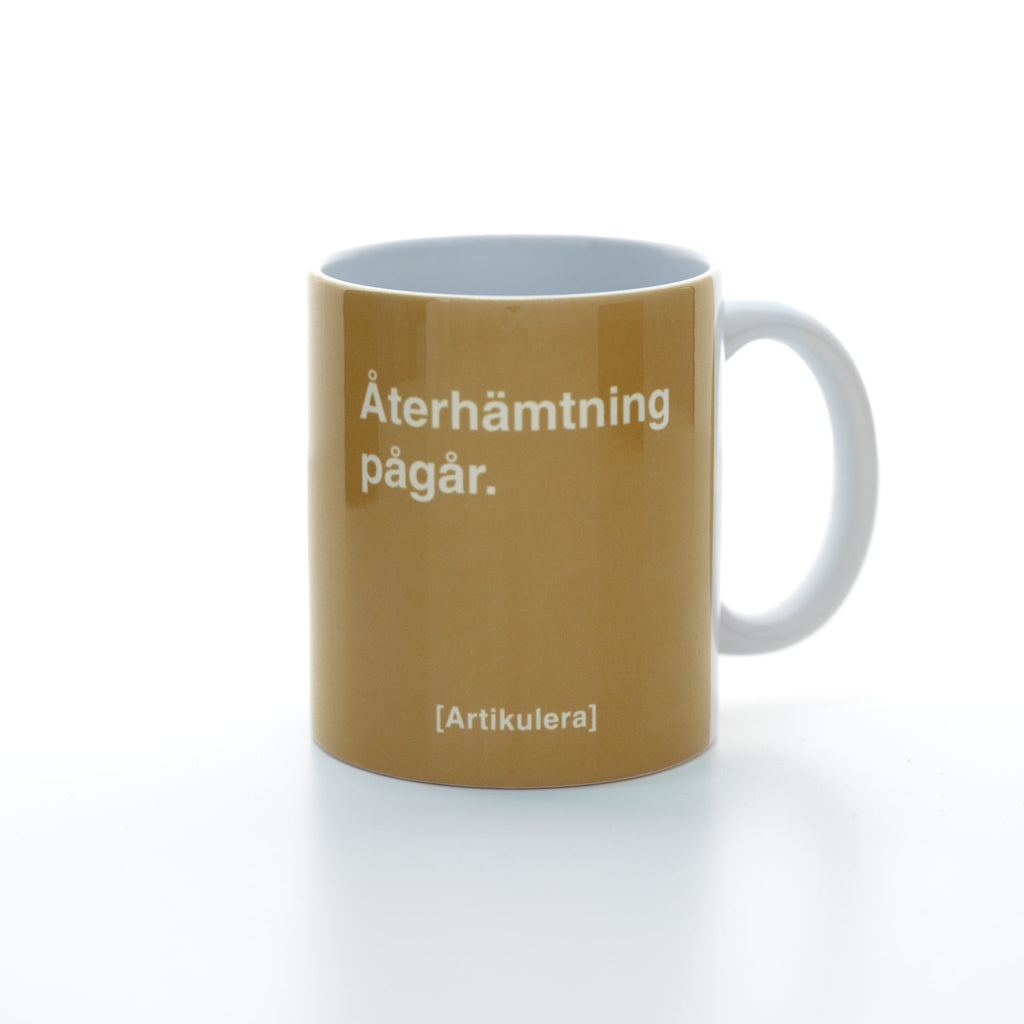 Artikulera-mugg — ”Återhämtning pågår.”