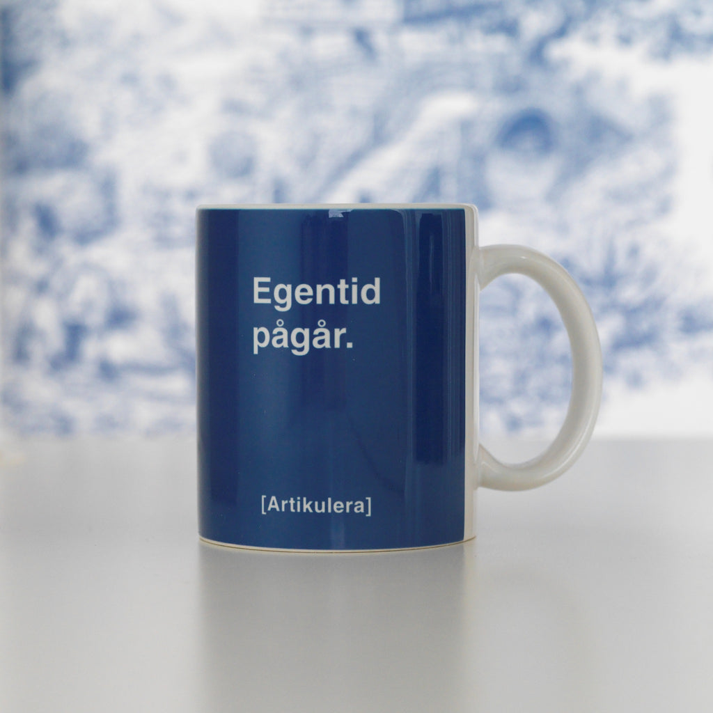 Artikulera-mugg — ”Egentid pågår.”